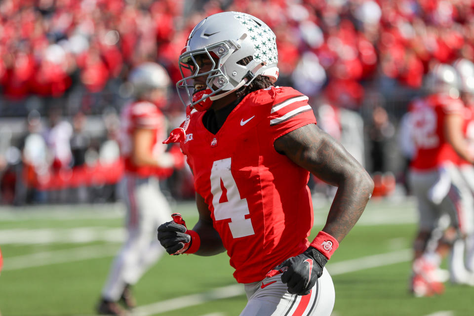 COLUMBUS, OH - OCTOBER 26: Ohio State Buckeyes wide receiver Jeremiah Smith (4) runs off the field after scoring a touchdown during the game against the Nebraska Cornhuskers and the Ohio State Buckeyes on October 26, 2024, at Ohio Stadium in Columbus, OH. (Photo by Ian Johnson/Icon Sportswire via Getty Images)