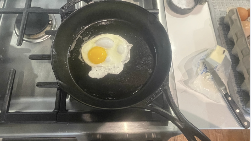 Lodge Blacklock skillet with fried egg on stove