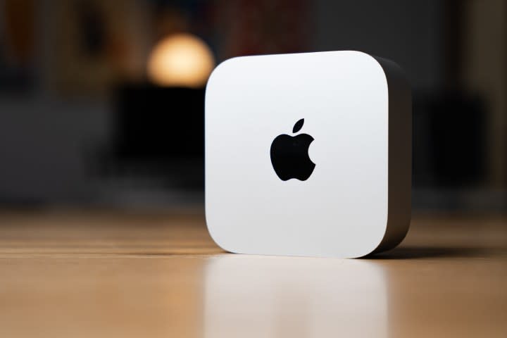 The Mac mini up on its side on a desk.