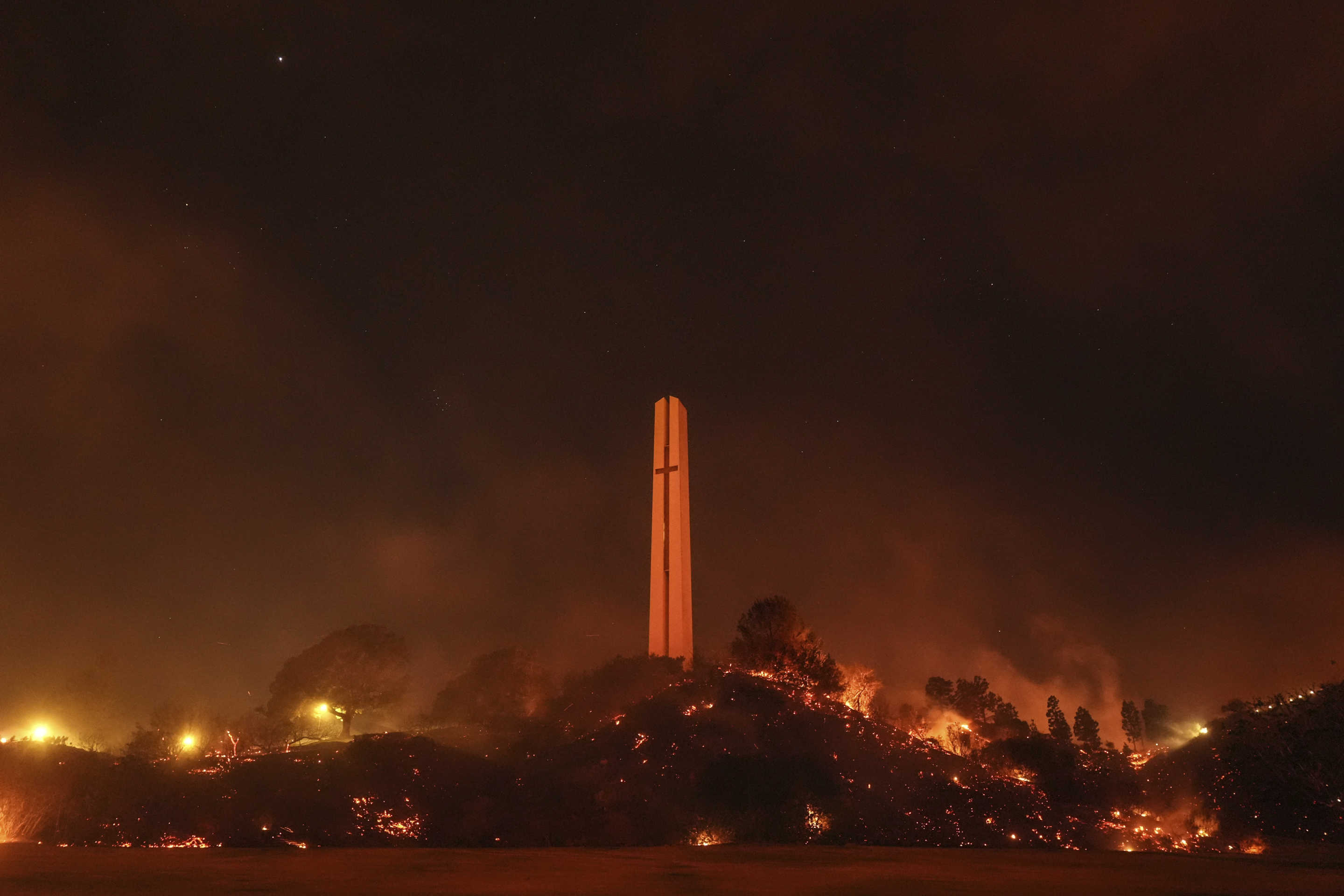 The Phillips Theme Tower as the fire climbs the hill.