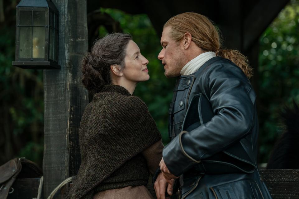 <em>Outlander</em>, starring Caitriona Balfe and Sam Heughan, will end with Season 8. (Robert Wilson/©Starz /Courtesy of the Everett Collection)