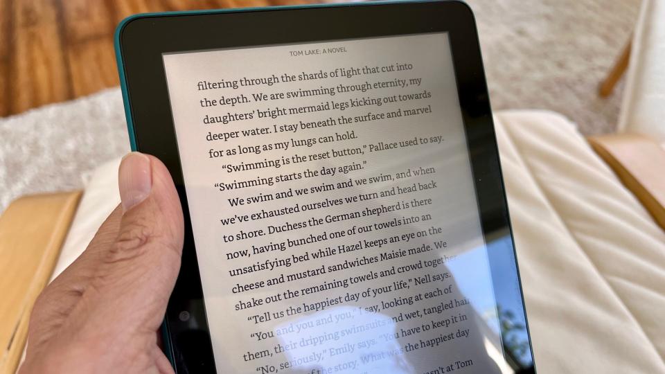 A photo of the Amazon Fire HD 8 tablet displaying an e-book.