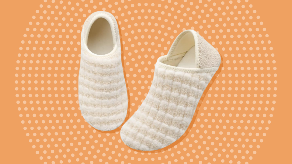 Cream and white striped slippers on an orange background