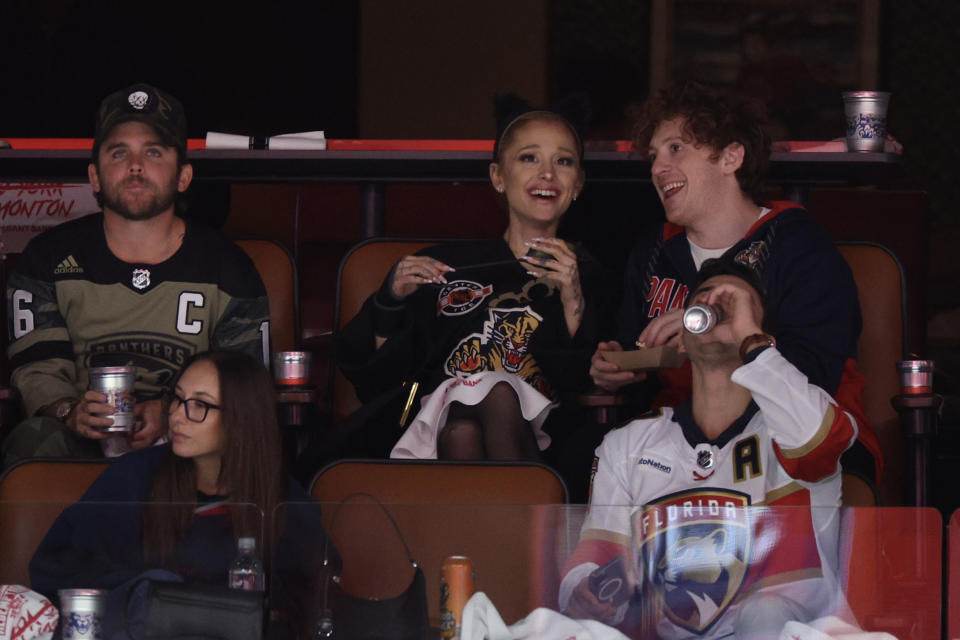 Ariana Grande and Ethan Slater watching the Stanley Cup Final in June.