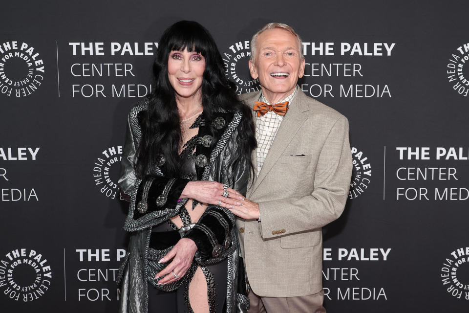 Cher and Bob Mackie at the world premiere of Bob Mackie: Naked Illusion looks at the costume designer's long career — and his collaborations with stars including Cher.