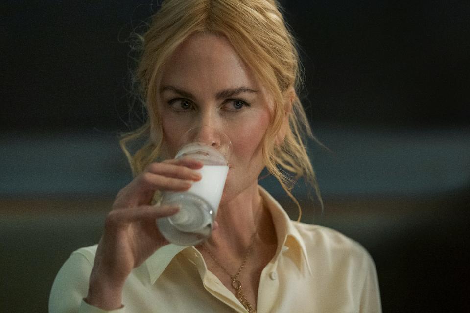 Nicole Kidman, drinking a glass of milk, in new erotic thriller 