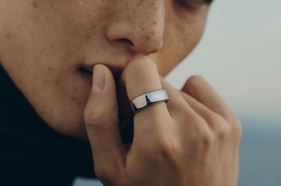 man wearing silver Oura Ring