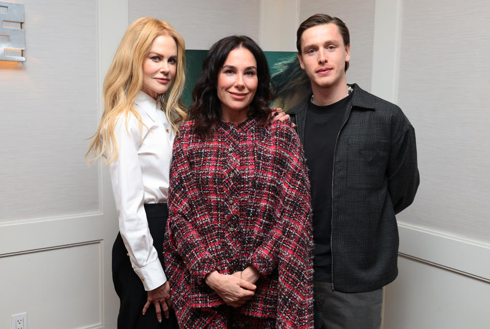 Nicole Kidman, Halina Reijn and Harris Dickinson stand posing for the camera.