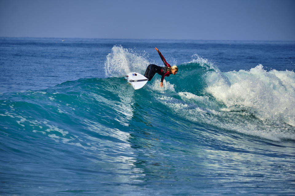 a person surfing a big wave in Dana Point