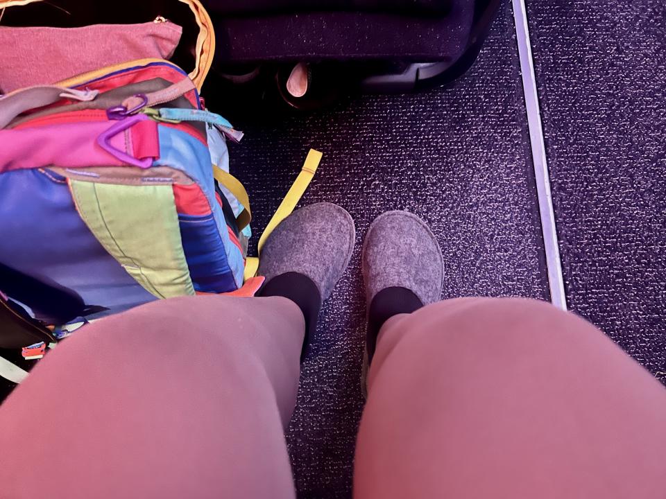 Finnair provided slippers to maximize comfort on long-haul flights. The thoughtful addition made a big difference, allowing passengers to stretch out fully in the cabin.