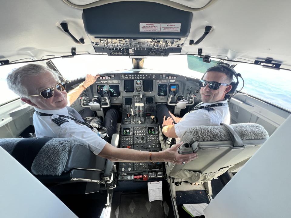 Captain Gary Lightfoot and his copilot showed me how things run (yes, they do use all of those buttons in every flight). 