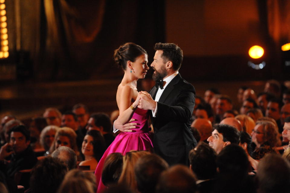 Sutton Foster, left, and Hugh Jackman dance during the 2014 Tony Awards. 