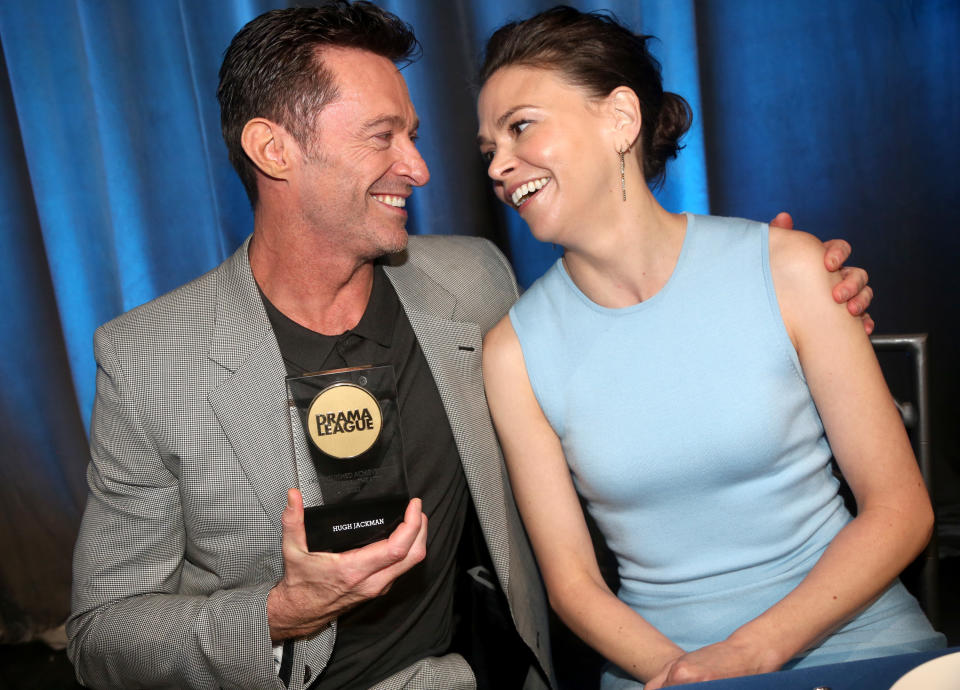 Hugh Jackman, left, holding an award, and Sutton Foster at the Drama League Awards in 2022.