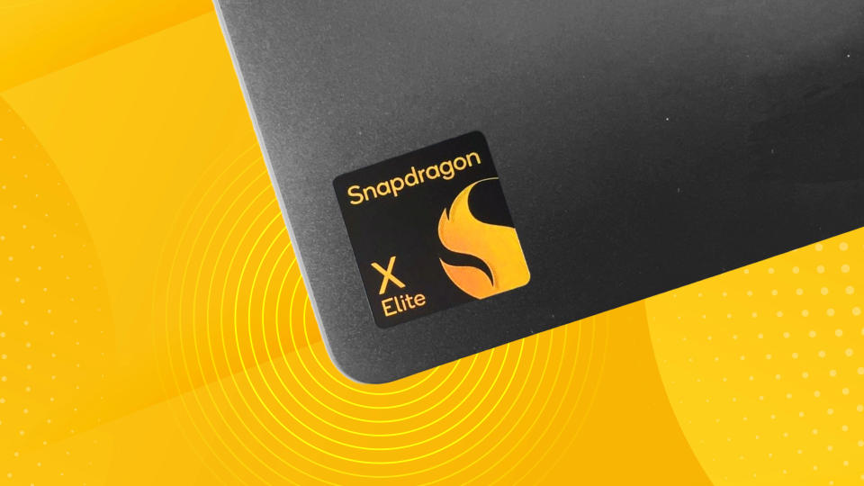  Close up of the Snapdragon X Elite sticker on the Lenovo Yoga Slim 7x with an abstract yellow background. 