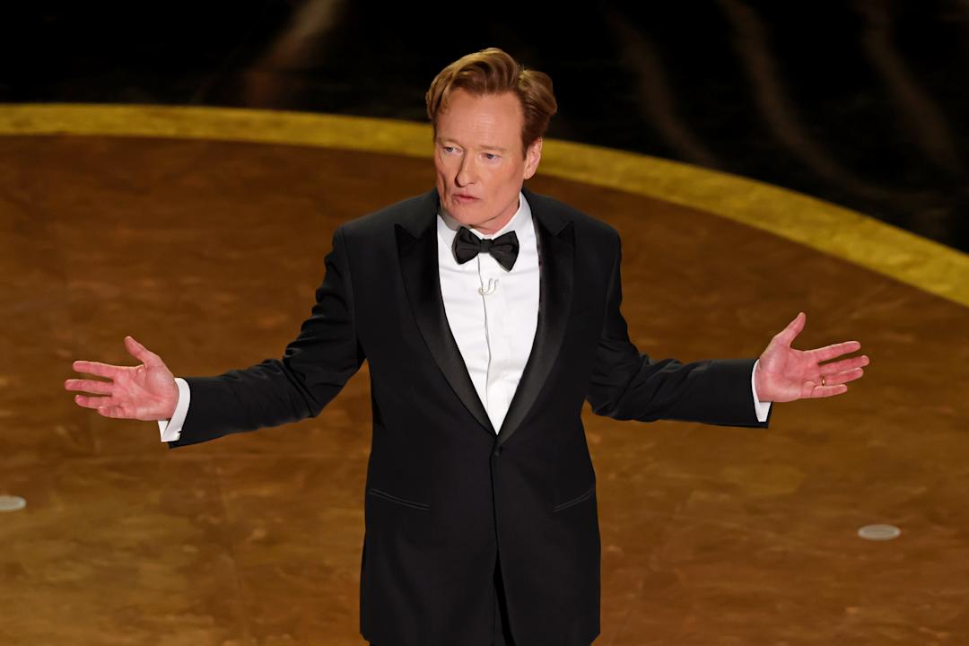Conan O'Brien speaks onstage.