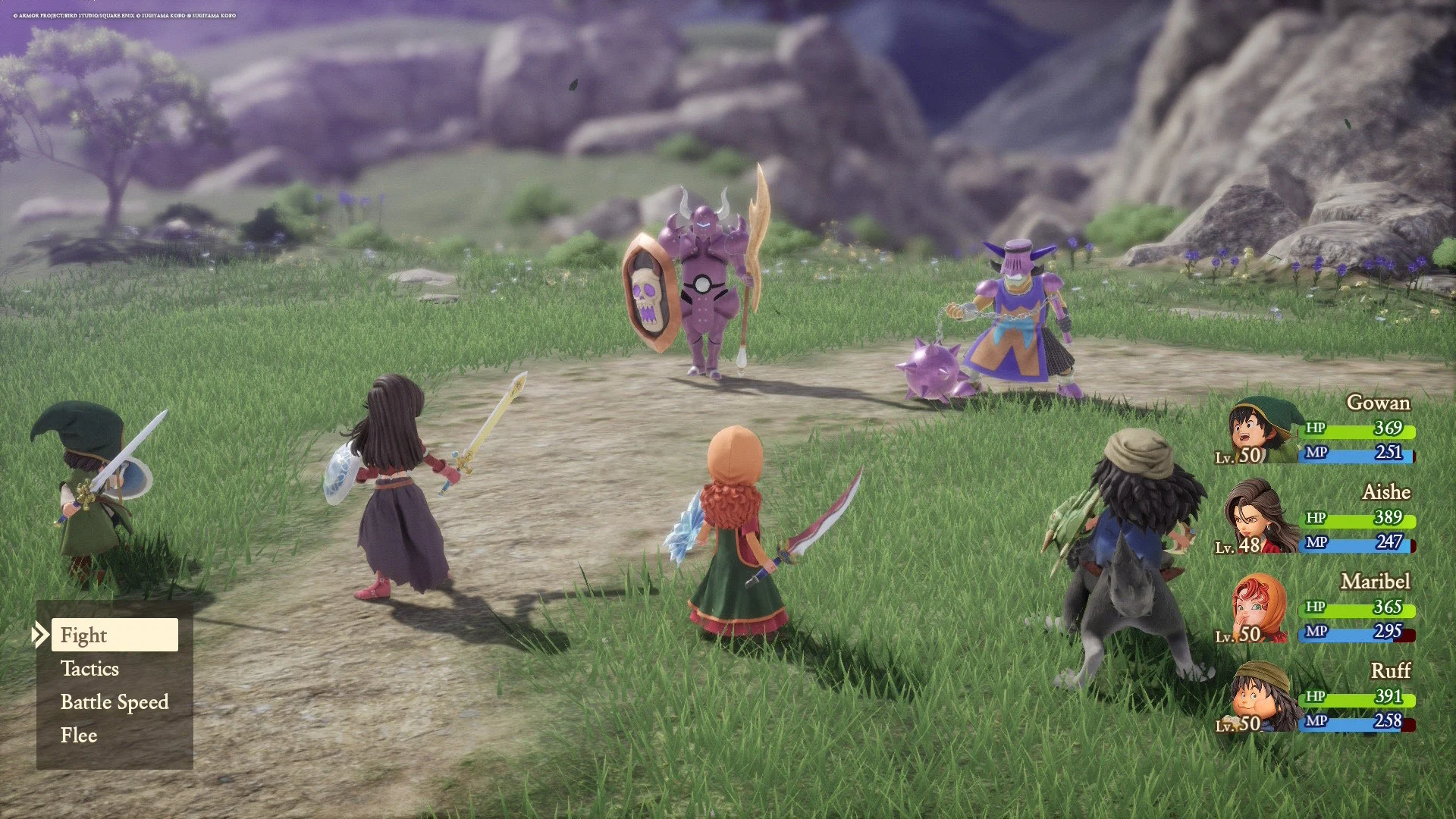 回合制战斗界面，显示英雄攻击一群史莱姆