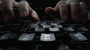 Two Sonos Play speakers positioned on grass in front of a sage colored bag in a 2026 setting